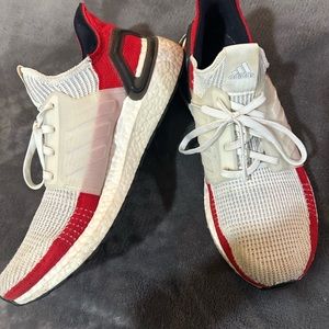Men's red white adidas Ultra Boost athletic shoes